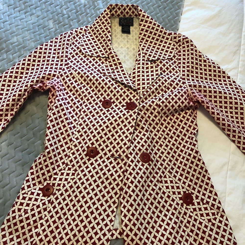 Red and white top coat.